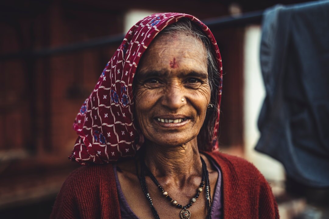 Studio portrait of a smiling older Chilean woman